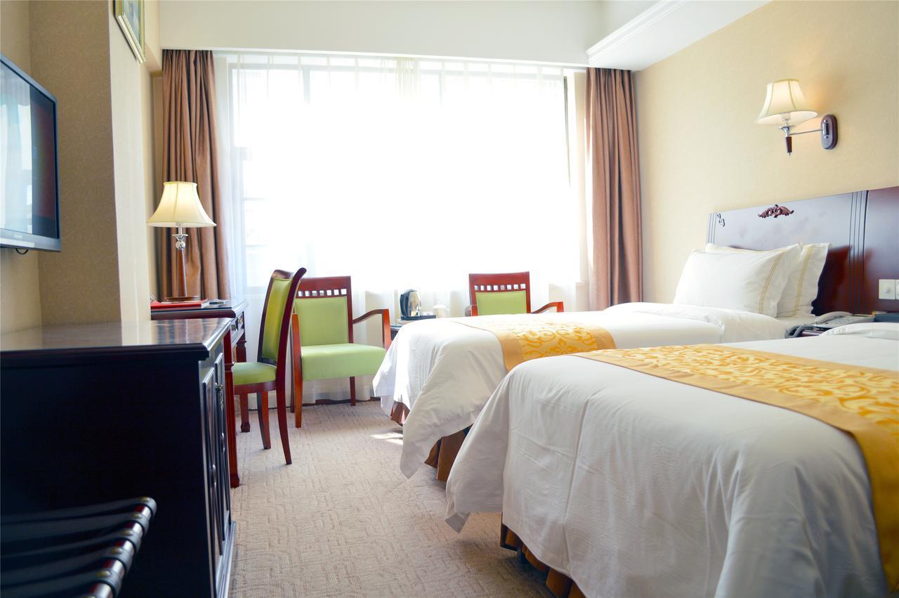 Vienna International Hotel Shanghai Baoshan Pangu Road Екстер'єр фото